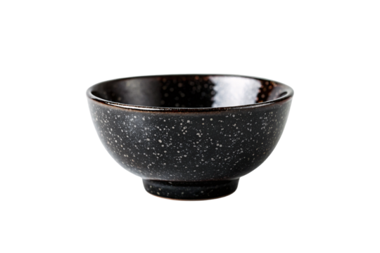 Black ceramic bowl with speckled white dots pattern, isolated on a transparent background