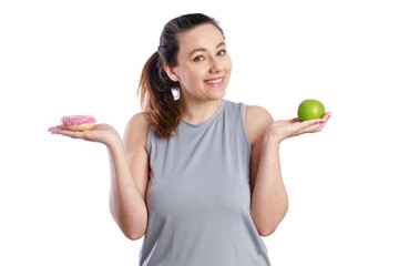 Choosing between doughnut and apple. Good nutrition for a healthy body