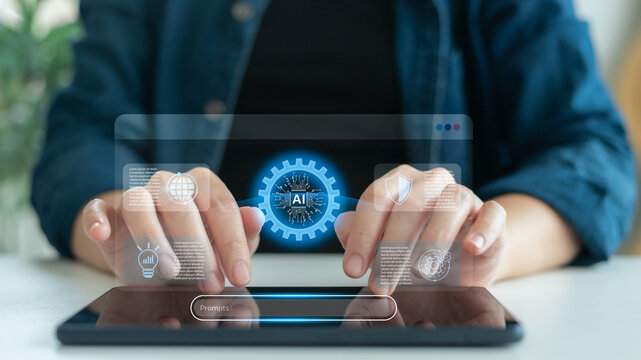Close-up of person using tablet with AI prompt interface and digital icons, representing artificial intelligence, smart technology interaction, and generative AI tools for modern