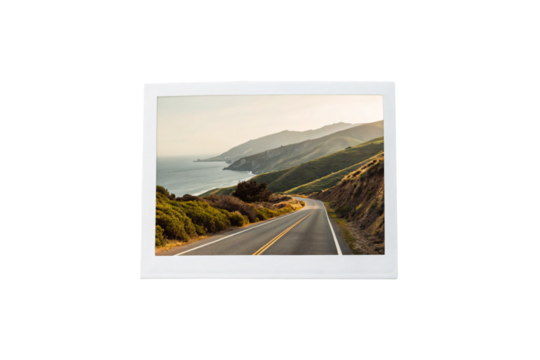 Winding coastal highway with ocean vista, golden hour lighting illuminating the scenic mountain landscape, isolated on a transparent background