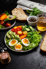 Healthy Salad Bowl with Avocado, Eggs, Tomatoes and Cucumbers,	