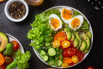 Healthy Salad Bowl with Avocado, Eggs, Tomatoes and Cucumbers,	