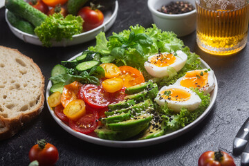 Healthy Salad Bowl with Avocado, Eggs, Tomatoes and Cucumbers,	