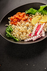 Noodle Bowl vegan fresh delicious gourmet food background on the table rustic food top view copy space keto and paleo diet vegan and vegetarian food