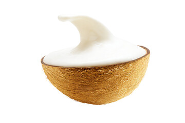 a coconut with a cream inside of it