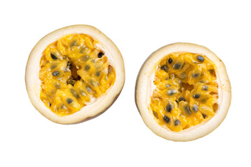 two halves of a passion fruit on a white surface