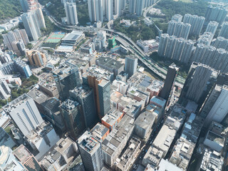 Aerial view of central Hong Kong, China showcasing dense cityscape with skyscrapers and urban...