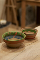 Painted details on handmade ceramic plates