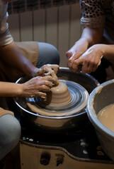 13. Crafting a ceramic bowl on the wheel with bare hands 