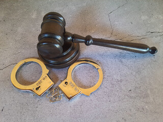 Judge's gavel and handcuffs
