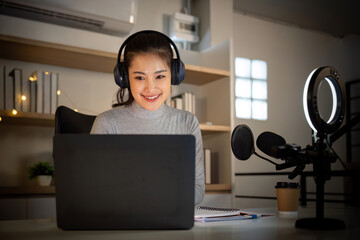 Podcast host engaging with audience from a cozy home studio