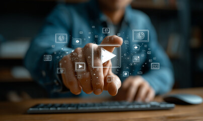 A person is using their finger to press the play button on an online video player