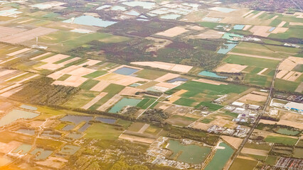 Obraz premium Peaceful summer landscape with glowing sunset colors from a drone perspective