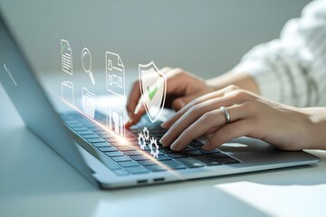 Data protection and cybersecurity concept with hands typing on laptop keyboard and digital icons representing security measures 