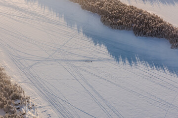 A husky sled is driven across a Lapland ice field