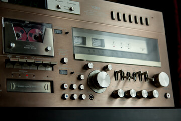 Vintage Audio Stereo Gear Setup Copper Front Panel with Multiple Controls Including Display, Knobs, Buttons, Keys, Switches