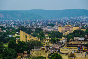 Iconic Pink City of Jaipur showcasing terracotta-hued buildings and magnificent Rajasthani architecture. Historic walled city with royal palaces and vibrant culture.