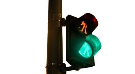 A Detailed Photo of a Traffic Light Showing Pedestrian Walk Signal at Night