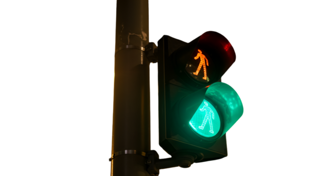 A Detailed Photo of a Traffic Light Showing Pedestrian Walk Signal at Night