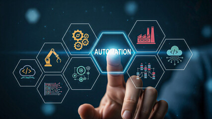 Hand activating futuristic automation interface; industrial technology, digital transformation, smart factory concept.