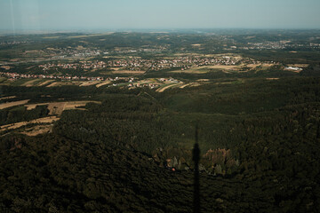 A panoramic view of Serbian countryside with forest and villages, as seen from Avala Tower in...