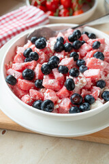 Tasty protein rich summer dessert with watermelon, blueberries and cottage cheese