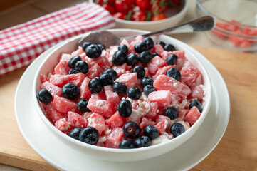 Tasty protein rich summer dessert with watermelon, blueberries and cottage cheese