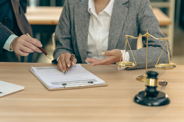 Courtroom, legal counsel with gavel and law. Justice and lawyer concept. Judge's gavel on table, close up.