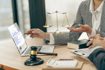 Courtroom, legal counsel with gavel and law. Justice and lawyer concept. Judge's gavel on table, close up.