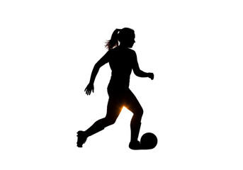 Abstract Silhouette Of Soccer Player Kicking Ball In Dark Background