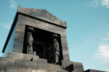 Side angle of the Monument to the Unknown Hero in Belgrade, Serbia. Solid granite structure with...