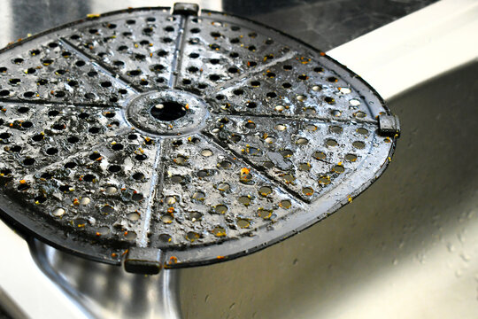 Dirty grunge air fryer basket with sticky food leftover. - Powered by Adobe