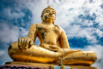 Golden Buddha located at Phra Buddha Nawalan Tue in the Golden Triangle in Chiang Rai, Thailand,...