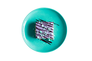 a blue plate with a piece of cake on it