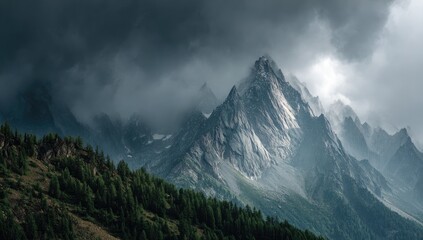 Obraz premium Majestic mountain peak, dramatic sky