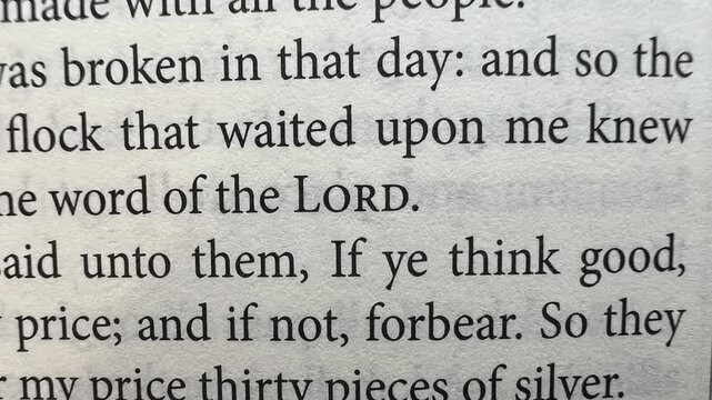 Inspirational video showing the word &ldquo;Lord&rdquo; at the center of the screen, while background images of Bible pages slowly change. A spiritual and calming motion clip ideal for worship
