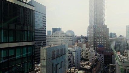 A drone takes off over a modern metropolis. Aerial view of Tokyo, Japan