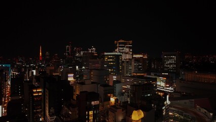 The drone takes off over the night metropolis. Tokyo, Japan from bird's eye view © m-art