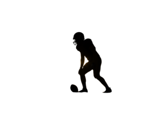 Football Player Silhouette Action Shot Isolated on Black Background