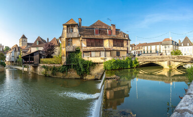 Obraz premium Scenic canal flowing through salies de bearn village in france