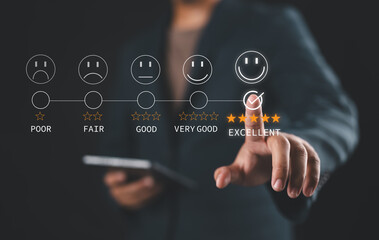 Businessman uses a stylus to mark 'Excellent' on a rating scale ranging from Poor to Excellent. Concept of high-quality performance and feedback.