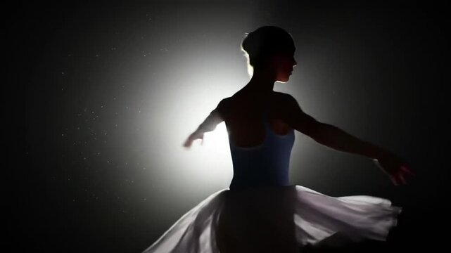 Graceful ballerina twirls in spotlight, capturing artistic movement and elegance