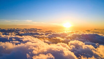 Fototapeta premium Golden Hour Above the Clouds: A Sunset Spectacle