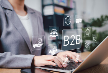 B2B Marketing and Business Collaboration Strategy Concept. Businesswoman using laptop with B2B...