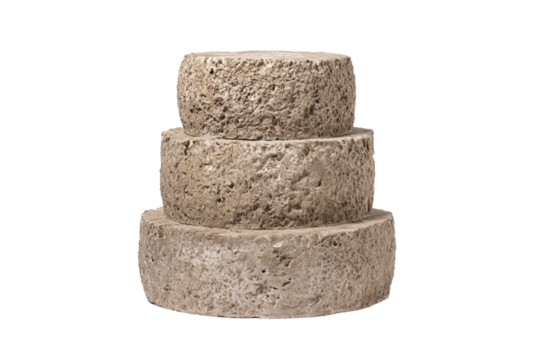 a stack of three stacked rocks on a white surface