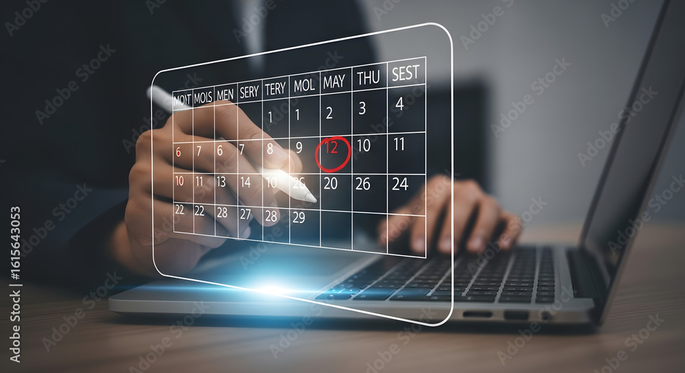Poster person using a digital calendar on a laptop, highlighting a specific date with a stylus.