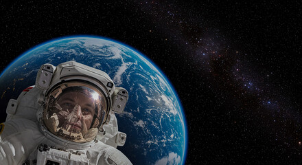 Astronaut floating in space with Earth and stars in background  
