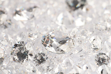 Many shiny diamonds on light background, closeup