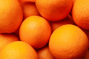 Fresh ripe oranges as background, top view