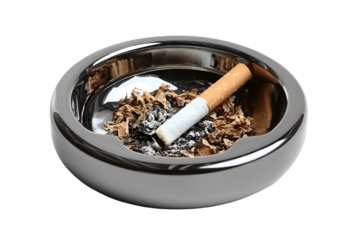 Burning cigarette in a dark ashtray full of ash,
